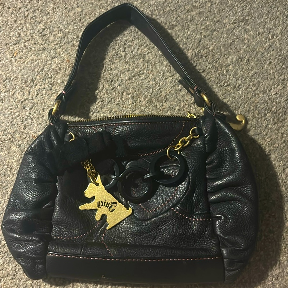 Juicy vintage bag the inside is peeling alittle but its still useable and adorbs